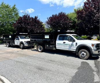 Two of the Greenville Junk fleet ready to haul away junk in Delaware