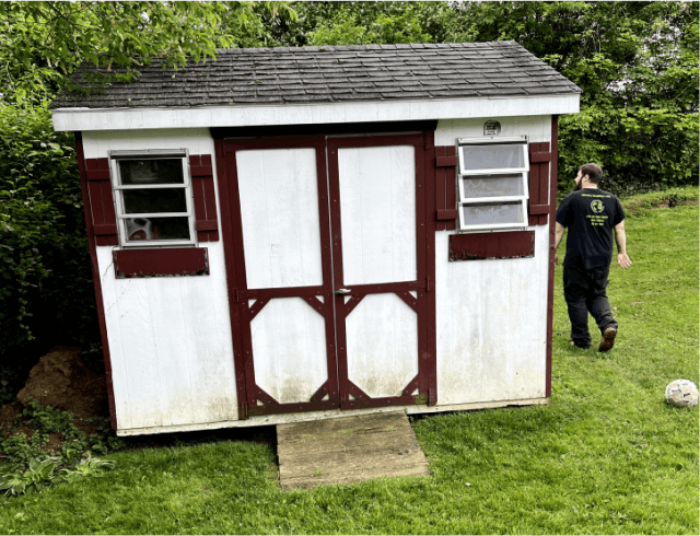 Shed ready for disassembly in a back yard in Delaware