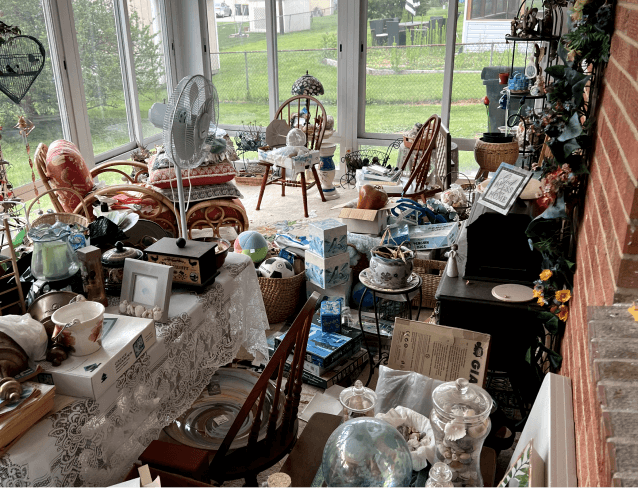 Clutter and junk of various sorts in a living room